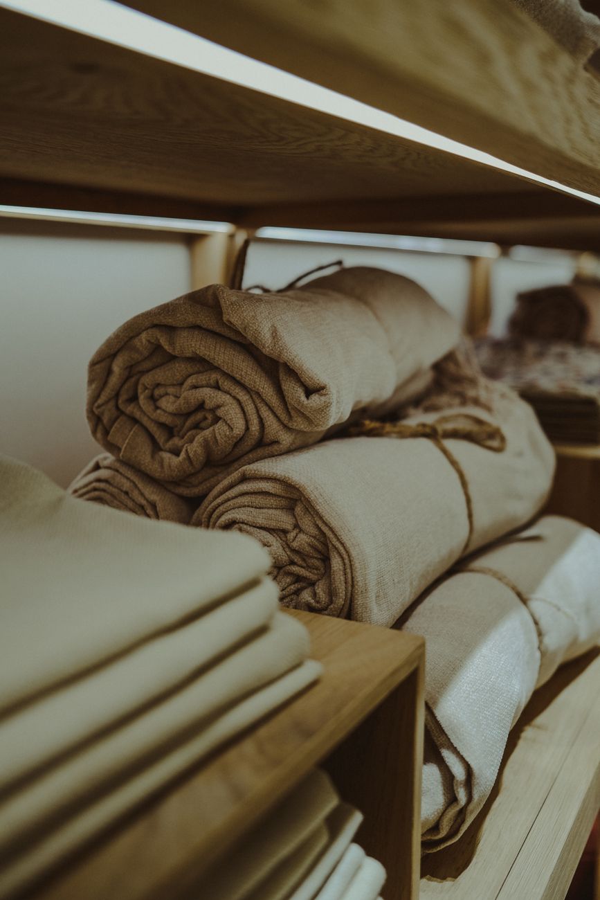 Folded robes on the cutting table